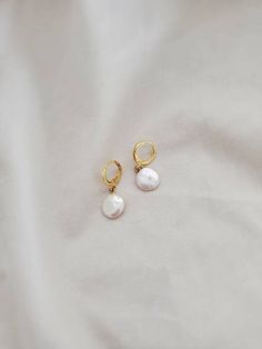 Hey, I found this really awesome Etsy listing at https://www.etsy.com/listing/885983937/natural-pearl-huggie-earrings-gold Hoop Pearl Earrings Gift, Hoop Pearl Earrings With Ear Wire For Gift, White Teardrop Hoop Earrings As Gift, Hoop Pearl Earrings With Ear Wire As Gift, Hoop Pearl Earrings For Gifts, White Small Hoop Huggie Earrings As A Gift, Handmade White Huggie Earrings As Gift, Gift Pearl Hoop Earrings Hypoallergenic, Minimalist White Dangle Huggie Earrings