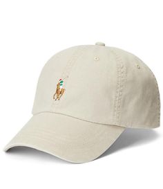 From Polo Ralph Lauren, this cap features:classic baseball cap silhouetteRalph Lauren's signature multicolored Pony embroidered at the frontseamed billsix-panel constructionembroidered ventilating eyeletssweatband at the interior"Polo Ralph Lauren" embroidery and a buckled leather strap at the backApprox. 23 1/4 circumferenceshell is cotton/elastaneback strap is leatherspot cleanImported. Classic Baseball Cap With Embroidered Logo, Classic Dad Hat With Embroidered Logo Visor, Classic Dad Hat With Embroidered Logo, Classic Visor Baseball Cap With Embroidered Logo, Classic Trucker Hat With Embroidered Logo Visor, Classic Trucker Hat With Embroidered Logo, Classic Dad Hat With Embroidered Logo And Flat Bill, Classic Beige Baseball Cap, Classic Beige Visor Dad Hat