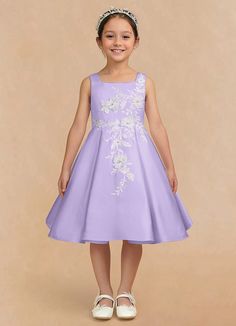 Kata is an elegant and sophisticated matte satin flower girl to wear. Her square neckline bodice is adorned with delicate hand sewn lace embellishments that cascade onto the box pleat full A-line skirt; that creates a voluminous and graceful silhouette. Satin Flower Girl Dresses, Lilac Flower Girl Dresses, Lavender Wedding Theme, Lace Embellishments, Lavender Wedding, Satin Flowers, Lilac Flowers, Dress Flower, Matte Satin