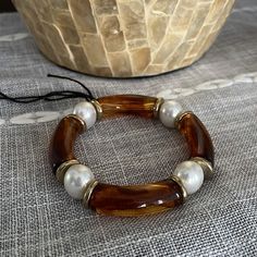 This Beautiful Bracelet Consists Of Amber Colored Tube Beads, Silver Tone Spacers, And Pearly Oval Beads. Really Beautiful, Especially For Spring And Summer! This Is A Brand New Item! Elegant Brown Bracelets With Large Beads, Elegant Large Beads Bracelets For Beach, Elegant Bangle Beaded Bracelets For Beach, Elegant White Stretch Bracelet For Beach, Elegant Stretch Bracelet With Round Beads For Beach, Elegant Beach Stretch Bracelet With Round Beads, Oval Beads, Amber Bracelet, Amber Color