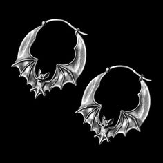 Elevate your style with the perfect blend of elegance and edge with our Flying Bat Hoop Earrings. These chic and charming earrings feature a captivating flying bat design, adding a touch of spooky flair to any outfit. Crafted in a sleek silver finish, they are approximately 1" in diameter, making them an ideal statement piece without being overpowering. The unique and secure bar-and-clasp closure ensures these earrings are suitable for both gauged and non-gauged piercings, offering a comfortable Bat Jewelry, Bat Earrings, Alternative Jewelry, Septum Jewelry, Funky Jewelry, Coven, Jewelry Inspo, Pretty Jewellery, Hook Earrings