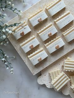 several pieces of white chocolate sitting on top of a table