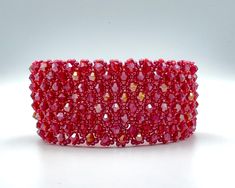 Red crystal bracelet Wide bracelet for women Beaded bracelet Sparkly bracelet Seed bead cuff bracelet Mothers day Jewelry gift Elegant Red Beaded Bracelets With Spacer Beads, Elegant Red Beaded Bangle Bracelet, Red Jubilee Bracelets For Parties, Red Jubilee Bracelet For Party, Adjustable Red Crystal Bracelet For Wedding, Handmade Elegant Red Crystal Bracelet, Elegant Red Crystal Bangle Bracelet, Elegant Handmade Red Crystal Bracelet, Elegant Red Beaded Bracelets