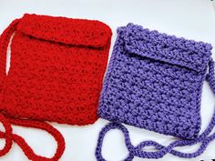 two crocheted purses sitting next to each other on a white table top