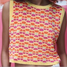 Retro Sleeveless Floral Jacquard Knit Sweater Vest Top - Yellow, Orange & Pink No Size: Fits Like S/M No Brand, Looks Just Like The Sweater Vest From Zara! Vibrant Retro Yellow, Orange, Pink, And Blue Retro Floral Print, 60s Or 70s Vibe. Sleeveless W/ Round Neck. Cropped Relaxed Fit Style. Soft Knit, 25% Nylon, 40% Acrylic & 35% Polyester Good Condition, New, Never Worn. No Flaws, Holes Or Stains. First Picture Is A Stock Photos, Photos Of The Actual Item After. Trendy Yellow Spring Vest, Spring Jacquard Knit Sweater Vest, Spring Yellow Top With Colorful Pattern, Yellow Sleeveless Vest For Fall, Casual Jacquard Knit Sleeveless Top, Yellow Sleeveless Sweater Vest For Spring, Retro Jacquard Knit Tops For Spring, Sleeveless Yellow Sweater Vest For Fall, Fitted Multicolor Knit Vest