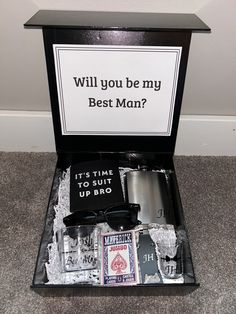 an open box with some items in it and a sign that says, will you be my best man?