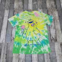 a tie dye shirt with a cartoon character on it