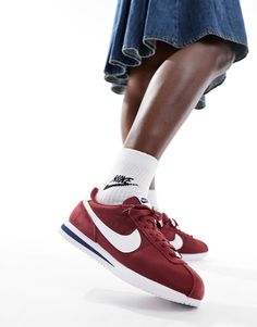 Shoes by Nike Get your kicks Low-profile design Lace-up fastening Padded tongue and cuff Signature Nike branding Durable rubber outsole Herringbone grip tread Red Nikes, Nike Cortez Outfit, Nike Air Max Jordan, Nike Branding, Burgundy Style, Winter Party Dress, Spring Floral Dress, Red Nike, Jumpsuit Shorts Rompers