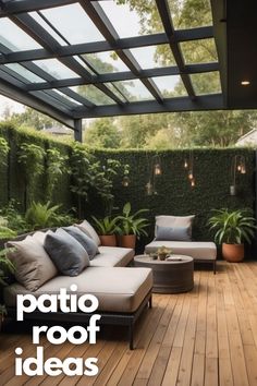 an outdoor patio with couches, tables and potted plants on the deck area