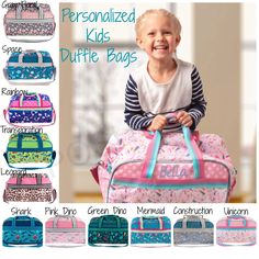 a child sitting on top of a duffel bag with different colors and patterns in it