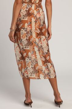 Brown Midi Skirt - Multi Print Skirt - Twist-Front Skirt - Lulus Spring Beachwear Skirt With Flowy Skirt, Spring Beach Skirt In Brown, Brown Beach Skirt For Spring, Spring Beach Brown Skirt, Vacation Pleated Midi Skirt Bottoms, Midi Pleated Skirt Bottoms For Vacation, Beach Midi Skirt With Elastic Waistband, Vacation Pleated Midi Skirt, Beach Pencil Skirt With Lining