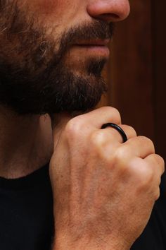 This simple, handcrafted black ring made of high-quality stainless steel is the perfect accessory for men looking for a subtle yet stylish piece of jewelry. With its minimalist design and matte black finish, this ring adds a modern and masculine touch to any outfit - ideal for everyday wear or special occasions. Details: Material: High-quality stainless steel with black finish Surface: Matte, scratch-resistant look Sizes: Available in different sizes for an ideal fit Design: Timeless and simple, Lifestyle Shoot, Black Ring, Ring Black, Men's Ring, Men Looks, Modern Man, Black Rings, Stylish Accessories, Black Men