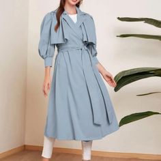 Elegant/ Dusty Blue/ Lapel Neckline/ 3 Quarter Length/ Bishop Sleeve/ Single Breasted/ Belted Tiered, Layer Trench Coat. Fall Spring Blue Belted Long Sleeve Outerwear, Casual Blue Outerwear For Brunch, Light Blue Outerwear For Spring Day Out, Spring Blue Outerwear For Brunch, Blue Spring Outerwear For Brunch, Blue Outerwear For Brunch In Spring, Blue Collared Outerwear For Spring, Mini Coat, Longline Trench Coat