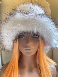 This beautiful incredibly soft faux fur hat is a must have for the fall and winter season.It is stylish and warm and can be dressed up or down. The head circumference of the hat is about 22-23inches (56-60cm) so almost everyone should fit :)  The hat is made out of Vegan Fur and is super soft and fluffy:) For any different color requests please send me an email:) Rave Hats, Fuzzy Bucket Hat, Faux Fur Hat, Festival Hat, Fake Fur, Fur Hat, Fur Coats, Bucket Hats, Polar Fleece