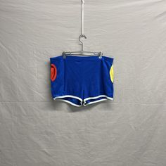 Large / 1970s Kmart Running Sprinter Blue/Red/Yellow 2" Inseam Vintage Shorts Waist: 16in + Stretch Length: 13in Inseam: 2in Check photos before purchasing! ITEM IS SECONDHAND! Please take the time to review our shop policies listed on our homepage before purchasing. We do NOT accept returns, but will gladly accept exchanges. All items are vintage, and sold AS IS. Thank you for shopping with us! - RatRunners Retro Color Block Bottoms For Summer, Retro Multicolor Color Block Bottoms, Fitted Retro Blue Shorts, Fitted 90s Blue Shorts, 1970s Style Blue Bottoms For Spring, Fitted Blue 1970s Style Bottoms, Vintage Fitted Blue Shorts, Fitted 1970s Style Blue Bottoms, 1970s Style Fitted Blue Bottoms