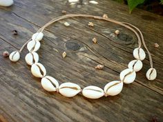 Hey, I found this really awesome Etsy listing at https://www.etsy.com/listing/623895044/cowrie-shell-necklace-seashell-choker Boho Wedding Gifts, Cowrie Shell Necklace, Beachy Jewelry, Boho Beach Wedding, Shell Choker, Beach Necklaces, Seashell Jewelry, Puka Shell, Diamond Choker