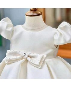 Buy cute baby girl satin wedding flower girl dress with butterfly cap sleeves at wholesale price online. Free shipping and pro custom service since 2009. Fitted Princess Dress With Satin Bow For Baptism, Fitted Princess Dress With Bow And Short Sleeves, Short Sleeve Princess Dress With Bow For Baptism, Fitted Princess Dress With Bow For First Communion, Fitted Princess Dress With Satin Bow For First Communion, Princess Dress With Satin Bow For Baptism, Satin Princess Dress With Bow For Pageants, Satin Princess Dress With Bow For Pageant, Satin Princess Dress With Bow For Wedding