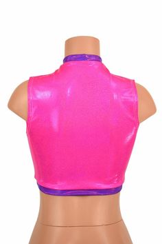 "This item is made to order, please read all the way through the listing before purchasing! This crop top is made from four way stretch spandex in uv glow pink sparkly jewel fabric Grape Holographic fabric accents around the middle opening, neckline, and hemline. It features a keyhole design in front, with a high back, and fits like a glove! TOP LENGTH: Underarm to hemline measures 8\" Womens Sizing (See below for instructions on where measurements should be taken) XXS: Bust 29\"-30\" / Waist 22 Purple Sleeveless Club Top, Pink High Stretch Racerback Tank Top, High Stretch Pink Racerback Tank Top, Stretch Sleeveless Rave Tops, Pink Fitted Sleeveless Vest, Sleeveless Stretch Rave Tops, Pink Fitted Crop Top For Sports, Pink Fitted Crop Top For Club, Pink Fitted Rave Crop Top