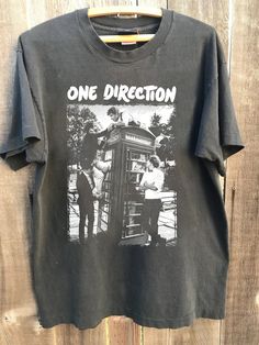 a t - shirt with the words one direction on it