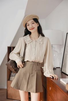 Button up shirt with a double scalloped collar, scallop trim placket details and long blouson sleeves. S: 15" across shoulders, 38.5" chest, 24.5" lengthM: 15.5" across shoulders, 40" chest, 24.5" lengthL: 16" across shoulders, 41.5" chest, 25" lengthXL: 16.5" across shoulders, 43" chest, 25" length Fitted Long Sleeve Tops With Scalloped Edges, Lace Collared Tops For Workwear, Lace Collared Top For Work, Long Sleeve Blouse With Lace Collar For Office, Office Blouse With Lace Collar And Long Sleeves, Workwear Top With Lace Collar, Long Sleeve Lace Trim Blouse For Work, Workwear Tops With Lace Collar, Long Sleeve Shirt With Lace Collar For Work