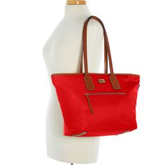 Sporty and Classic    This sporty classic holds everything you need for the morning commute or extra clothes for a trip to the gym. All-weather nylon, Vacchetta leather trim, and heritage details exude signature all-American style. Classic Red Shoulder Bag For Travel, Red Shoulder Bag With Leather Trim For Travel, Classic Red Bags With Leather Trim, Red Travel Bags With Leather Trim, Red Bags With Leather Trim For Travel, Red Bags With Leather Trim For Everyday Use, Red Shoulder Bag With Zipper For Travel, Red Shopping Bag With Leather Trim, Red Leather Trim Shopping Bag