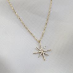 Pave Pole Star Necklace 0.17ct Diamond Gemstone 14k Solid Gold Celestial Pendant Gold Shining North Star Necklace Christmas Gift For Her ▶ 𝙋𝙍𝙊𝘿𝙐𝘾𝙏 𝙁𝙀𝘼𝙏𝙐𝙍𝙀𝙎 * 14k Solid Gold Necklace * Total Carat: 0.17ct * Diamond Quality: G Colour VS Clarity * Total Numbers Of: 33 * Poler Star Width: 1.75 cm ( 0.69 inches) * Pole Star Length: 2 cm ( 0.79 inches) ❤️ A quality design that will amaze you with its shine that you can choose for your daily or special occasions. Complete the elegance of Star-shaped Brilliant Cut Necklace For Gift, Star-shaped Brilliant Cut Necklace, Star-shaped Cubic Zirconia Diamond Necklace Gift, Celestial 14k Gold Diamond Necklace Gift, Star-shaped Diamond White Necklace With Single Cut Diamonds, Elegant Starburst Jewelry With Brilliant Cut, Elegant Starburst Brilliant Cut Jewelry, Star-shaped Diamond Necklace With Single Cut Diamonds, Diamond Starburst Necklace With Accents