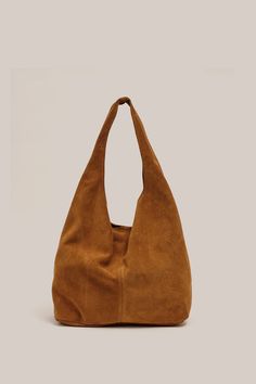 PRE - ORDER Shipping From October 16th , 2024 Crowned by ELLE magazine as the next must-have bag, the Sienna Suede Hobo Bag is a relaxed shoulder bag with a magnetic stud closure at the top. Sienna is the new perfect slouchy tote to elevate your everyday. Please see product image for most accurate colour. Our VESTIRSI Suede Hobo Bag, Crossbody Saddle Bag, Slouchy Tote, Slouchy Bag, Work Tote Bag, Suede Bag, Suede Handbags, Autumn 2024, Leather Coin Purse