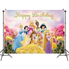 a happy birthday banner with princesses in the background