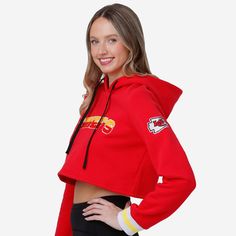 Stand out at the tailgate. Catch the eye of the jumbotron. Or just be the best-dressed fan in the crowd. Because the Kansas City Chiefs Women's Cropped Chenille Hoodie is here for you all gameday long. Features All-over, team-colored design so you can rep the team in style Bold team name display with chenille texture on chest, in case there were any doubts where your allegiances lie Team logo display with chenille texture on left sleeve for a little extra team spirit Team-colored stripe accent o Logo Display, Team Gear, Team Name, Team Names, Kansas City Chiefs, Bold Fashion, Team Spirit, The Eye, Kansas City