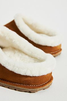 Zermatt Shearling Clogs by Birkenstock in Brown, Women's, Size: 37, Rubber/Suede/Shearling at Anthropologie Shearling Clogs With Leather Footbed Slip-on, Shearling Slip-on Clogs With Leather Footbed, Winter Shearling Clogs With Cushioned Footbed, Winter Clogs With Suede Lining And Comfortable Style, Winter Clogs With Suede Lining, Winter Suede Clogs With Leather Footbed, Winter Comfortable Clogs With Suede Lining, Comfortable Winter Mules With Suede Lining, Winter Closed Toe Clogs With Leather Sole