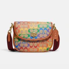 Coach, Leather, Multicolors, Turnlock Closure, Medium Size Multicolor Top Handle Coated Canvas Shoulder Bag, Multicolor Coated Canvas Top Handle Shoulder Bag, Multicolor Coated Canvas Shoulder Bag With Dust Bag, Luxury Multicolor Bag With Adjustable Strap, Multicolor Coated Canvas Satchel Bag, Designer Multicolor Bag With Adjustable Strap, Designer Multicolor Bags With Adjustable Strap, Designer Multicolor Shoulder Bag With Adjustable Strap, Multicolor Coated Canvas Bag With Removable Pouch