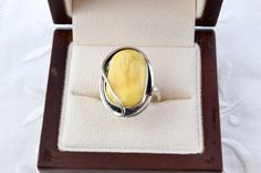 Ring made of 925 sterling silver and natural Baltic amber in yellow color. Oval yellow ring, handmade.  The ring size is 6 1/2, the inner diameter is 17 mm.  The size of the stone is 13 x 19 mm.  The weight of the ring is 6.4 g.  The condition is excellent. Vintage and antique items are sold as is. This is a unique thing from the last century. It can be a wonderful gift for a particular person or yourself.  It will also be a great addition to your collection.  If you love vintage jewelry, please Yellow Ring, Yellow Rings, Amber Ring, Amber Jewelry, Unique Things, Baltic Amber, Ring Handmade, Antique Items, Jewelry Handmade