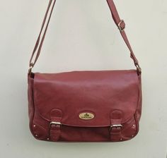 Vintage Rowallan dark red / burgundy leather satchel messenger bag, long cross body shoulder strap;  Classic satchel styling with buckle detailing to the front with magnetic snap for ease of closure.  Long adjustable length cross body shoulder strap.  Inside lined in red material which does have a little catching near the zip pocket (shown in the photo)  there are also two leather trimmed pouch pockets, lining is clean.  The overall condition of the bag is very good, no major scuffing or damage. Vintage Burgundy Shoulder Bag With Adjustable Strap, Vintage Burgundy Shoulder Bag For Everyday, Vintage Burgundy Bag With Adjustable Strap, Classic Burgundy Shoulder Bag With Adjustable Strap, Burgundy Flap Bag With Detachable Strap For Everyday Use, Burgundy Rectangular Satchel With Adjustable Strap, Classic Burgundy Bag With Adjustable Strap, Burgundy Shoulder Bag Satchel With Adjustable Strap, Classic Burgundy Satchel Shoulder Bag