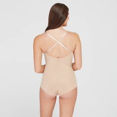 This versatile bodysuit is the ultimate solution for low-back dresses! The flawless-finish fabric is lightweight, cling-free, and offers 360 degrees of comfortable, single-layer shaping for a sleek, all-over feel. And, best of all? The innovative design features lightly padded, fit-flexible wireless cups and adjustable, convertible straps for a variety of styling options Sculpting Full Coverage Bodysuit With Built-in Bra, Supportive Fitted Shapewear With Built-in Bra, Fitted Full Coverage Swimwear With Built-in Bra, Stretch Backless Bodysuit With Built-in Bra, Stretch Nylon Bodysuit With Built-in Bra, Backless Nylon Leotard With Built-in Bra, Second-skin Shapewear With Built-in Bra And Full Coverage, Second-skin Shapewear Leotard With Built-in Bra, Shapewear Leotard With Built-in Bra