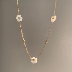 - This cute flower necklace is made of 18K GOLD PLATED stainless steel chain , and 3 flower charms.  - Super simple and cute, goes well with all your outfits! - length:  14.5 inches +2 inches of extender chain.  -Shipping: All orders will be shipped out within 1-2 business days after the order has been received. Ship from New York, United States. USPS first class mail on this order. 🚗 - Thank you for visiting my listing. - For more beautiful neacklaces like this: https://www.etsy.com/shop/Funbeadsbygrace1?ref=dashboard-header&section_id=50341900 -  Follow us on Instagram: funbeadsbygrace for more beautiful creations and updates on the shop! Dainty Jewelry With 3d Flower Details, Dainty Flower Shaped Jewelry With 3d Flowers, Dainty 3d Flower Jewelry, Dainty Necklace With Flower Pendant, Gold Plated Flower Necklace With Charm, Gold Plated Flower Necklace With Flower Charm, Dainty Flower Necklace With Flower Charm, Delicate Gold Flower Necklace, Gold-plated Flower Necklace With Clavicle Chain