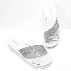 These Light Weight Sandals Are Easy To Wear For Warmer Days New In Box Foam Material Rhinestone Encrusted And Clear Pvc Straps Slip On Style Cushiony Foam Sole Fitting: True To Size Heel Height: 1.5 In. Embellished White Synthetic Sandals, White Synthetic Sandals With Rhinestones, White Rhinestone Sandals For Vacation, Bed Stu Sandals, Leather Birkenstocks, Lace Up Sandal Heels, Foam Sandals, Slip On Wedge Sandals, Toe Loop Sandals