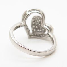 925 Sterling Silver C Z Openwork Double Heart Design Ring WELCOME TO PAWN SHOP We are an actual pawn shop and have been in business for over 25 years. Since 1990, our establishment has been serving a variety of clients by providing them with short term cash solutions and options of liquidity regarding their treasured heirlooms. Acknowledging that today′s customers are very sophisticated and are looking for a variety of investments, our acquisitions are hand-picked for our special clientele. We d Hallmarked Heart-shaped Diamond Ring, Heart-shaped Hallmark Ring For Anniversary, Heart-shaped Anniversary Ring With Hallmark, Hallmarked Heart-shaped Diamond Ring For Anniversary, Hallmarked Heart Ring For Anniversary, Silver Double Heart Diamond Ring, Silver Double Heart Ring For Anniversary, Silver Rings With Hallmarks For Valentine's Day, Heart-shaped Anniversary Rings With Hallmarks