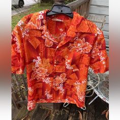 Royal Hawaiian Floral Shirt Mens L Button Down Red Orange Yellow Polyester Vtg 60s 70s Vintage 1960s 1970s. Button Down Short Sleeve Shirt. 100% Polyester. Nwot. New Without Tags. One Front Pocket. Measurements Are Approximate: Underarm To Underarm - 24”, 48” Shoulder To Hem - 27” No Stains, Fading, Rips, Tears, Or Holes. See Pictures For Additional Details Of Condition. Smoke Free Home. Vintage Red Camp Shirt With Camp Collar, Red Retro Shirt With Camp Collar, Retro Red Shirt With Camp Collar, Retro Orange Collared Shirt, Retro Hawaiian Shirt With Button Closure For Summer, Retro Red Summer Shirt, Retro Button-up Hawaiian Shirt, Vintage Red Hawaiian Shirt For Summer, Retro Hawaiian Shirt For Beach With Button Closure