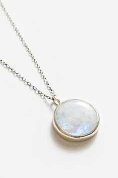 Moonstone, often linked to the divine feminine, is believed to harness the moon's energy, bringing calm, balance, and intuition to its wearer. This gem is said to soothe emotional instability, stress, and hormonal imbalances, while also promoting inspiration. Style this minimalist and ethereal pendant with a v-neck and jeans during the day and switch to a slip dress for a chic evening look. Note: each stone is one-of-a-kind so there may be slight variations in each piece. Johnny Was Women's Jose Spiritual Moon-shaped Everyday Jewelry, Delicate Round Moon Phase Necklace, Celestial Round Necklace For Meditation, Elegant Jewelry With Moon Charm For Meditation, Celestial Moon-shaped Jewelry For Meditation, Celestial Moon Jewelry For Meditation, Minimalist Moon Phase Jewelry For Healing, Minimalist Round Jewelry For Meditation, Celestial Sterling Silver Jewelry For Meditation