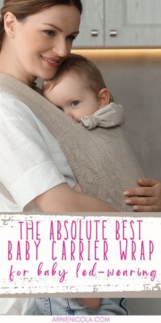 a woman holding a baby in her arms with the words, the absolute best baby carrier wrap ever