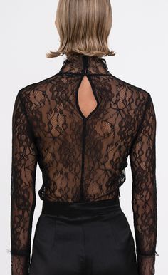 The Mary Lace Top is an elegant addition to your wardrobe. Crafted from the finest sheer lace fabric, this long-sleeve, high-neck top is a bold piece that will elevate your look. Elegant High Neck Stretch Mesh Top, Black Turtleneck Mesh Top For Party, Long Sleeve Lace Patchwork Top For Night Out, Stretch Lace Mesh Top For Party, Stretch Lace Long Sleeve Top For Night Out, Stretch Lace Top With Long Sleeves For Night Out, Stretch Long Sleeve Lace Top For Night Out, Party Mesh Top With Lace Trim And Stretch, Elegant High Neck Lace Top For Party