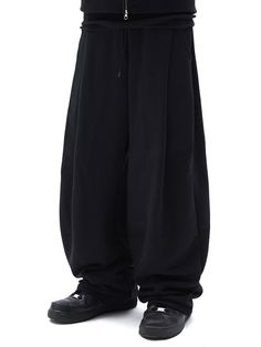 This is a comfortable and trendy pants by SUADE that is made out of high quality cotton and polyester blend fabric. With unique design detail with trendy look, it will stand out from your casual and young daily outfit.- Wide silhouette with double tuck- Elastic waistband detail- 410 GSM sturdy fabric Baggy High-waisted Cotton Pants, Black Wide Leg Pants For Spring Streetwear, Cotton Techwear Parachute Pants Ankle-length, Cotton Techwear Parachute Pants With Tapered Leg, Cotton Ankle-length Parachute Pants Techwear, High-waisted Cotton Parachute Pants For Fall, Techwear Cotton Parachute Pants With Tapered Leg, Fall High-waisted Cotton Parachute Pants, Techwear Cotton Sweatpants With Tapered Leg