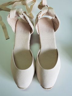 "Lace up, rope sole espadrille PUMP wedges (5cm heels = 1.97 inches) in IVORY with reinforcement stitching in the front. Antislippery soles covered with rubber. In order to prevent the fraying of the ribbons, the ribbon ends are glued, what makes a quite nice closing (see last pic for details). The comfiest wedge for walking! 👣 🦋 VEGAN SHOES, animal friendly & sustainable. Eco friendly. Jute fiber has excellent insulating properties and low thermal conductivity. It is environmentally frien Summer Lace-up Canvas Espadrilles, Beige Lace-up Espadrilles With Woven Sole, Beige Closed Toe Espadrilles With Woven Sole, Cream Espadrilles With Rubber Sole For Summer, Casual Cream Lace-up Espadrilles, Cream Round Toe Canvas Espadrilles, Cream Canvas Espadrilles With Round Toe, Beige Canvas Espadrilles For Summer, Cream Closed Toe Espadrilles With Woven Sole