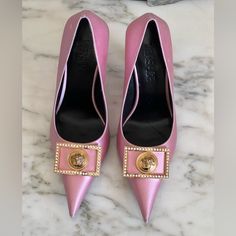 Versace Biggie Pink Crystal Embellished Plaque Pointed Toe Pumps Rare. Size Eu 35.5, Us 5.5. These Versace Pumps Are Made In Italy From Shiny Hot Pink Satin And Feature Sharp, Pointed Toes, And Elegant Spool Heels. The Style Is Finished With Gold-Toned, Crystal-Embellished Medusa Biggie Plaques. Lining: Leather Sole: Leather Insole And Sole Toe Shape: Pointed Toe Upper: Fabric. No Box. No Dustbags. Never Worn. Gently Handled. Store Display. Tried On. Made With Delicate Satin, Note; There Are Som Spool Heels, Versace Pumps, Pump Heels, Spool Heel, Fashion Heels, Store Display, Dream Shoes, Pink Satin, Pink Crystal