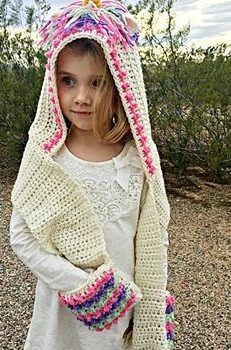 Lots of kids are crazy about Unicorns!Any girl would absolutely love to receive such gift and to keep ears and fingers nice and warm and be magical.Really easy quick pattern to crochet this Unicorn Hooded Scarf with Pockets Crochet Pattern by Sheryl of the Lady Behind the Curtain is a really nice, easy hooded scarf … Crochet Scarf With Pockets, Crochet Hoodies, Scarf With Pockets, Crochet Hooded Scarf, Hood Pattern, Unicorn Hoodie, Hoodie Pattern, Crochet Unicorn, Unicorn Pattern