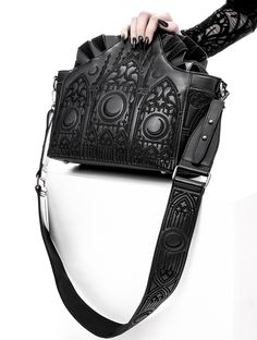 Elevate your gothic fashion with our goth dark altar shoulder bag. designed for those who embrace the darker aesthetic, this stylish and functional accessory combines edgy details with practicality. shop now and complete your alternative look. Cheap Gothic Bags For Concerts, Cheap Black Alternative Bags, Cheap Gothic Party Bag, Cheap Edgy Mid-rise Jeans, Cheap Gothic Bags With Adjustable Strap, Cheap Gothic Shoulder Bag, Affordable Gothic Halloween Bags, Cheap Gothic Bags For Halloween, Kawaii Goth Handbags