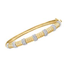 Ross-Simons - .78ct t. w. Diamond Station Bangle Bracelet in 14kt Yellow Gold. 7". Spruce up your stack with some modern decor! This fabulous bangle bracelet features shimmering .78 ct. t. w. diamond stripes stationed along a ribbed backdrop that gleams in polished 14kt yellow gold. The unique design would also make a noticeable statement when sported solo. Hinged with a figure 8 safety. Box clasp, diamond station bangle bracelet. Diamond birthstones are the perfect gift for April birthdays. Safety Box, Bracelet Diamond, April Birthday, Diamond Birthstone, Figure 8, Box Clasp, Diamond Bangle, Diamond Bracelets, Bangle Bracelet