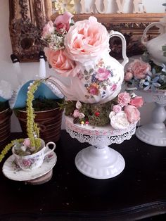 Teapot tilted, moss greenery to cover added items for detail Teapot Centerpiece, Tea Party Centerpieces, Tea Cup Centerpieces, Cup And Saucer Crafts, Vintage Tea Parties, Alice In Wonderland Tea Party Birthday, Teacup Crafts, Tea Party Table, Deco Champetre