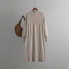 Elevate your autumn and winter style with our Loose Mid-Length Bottoming Knitted Dress. This versatile dress features a V-neck, long sleeves, and a loose silhouette, providing both warmth and fashion-forward flair.Crafted from high-quality woolen fabric, this dress ensures comfort and insulation during colder seasons. The loose fit allows for easy movement, making it an ideal choice for various occasions. The mid-length design adds a touch of modesty and sophistication.The V-neck and long sleeves create a classic and timeless look, making this dress suitable for both casual outings and more dressed-up affairs. Pair it with your favorite boots or heels for a chic and stylish ensemble that embraces both warmth and fashion.Step into autumn and winter with confidence. Our Loose V-neck Knitted Winter Sweater Dress, Turtleneck Pattern, Oversized Knitted Sweaters, Knitted Dress, Daily Dress, Versatile Dresses, Knit Sweater Dress, Social Events, Knitted Sweater