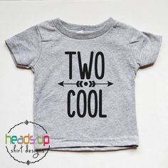 a t - shirt that says two cool with an arrow on the front and back